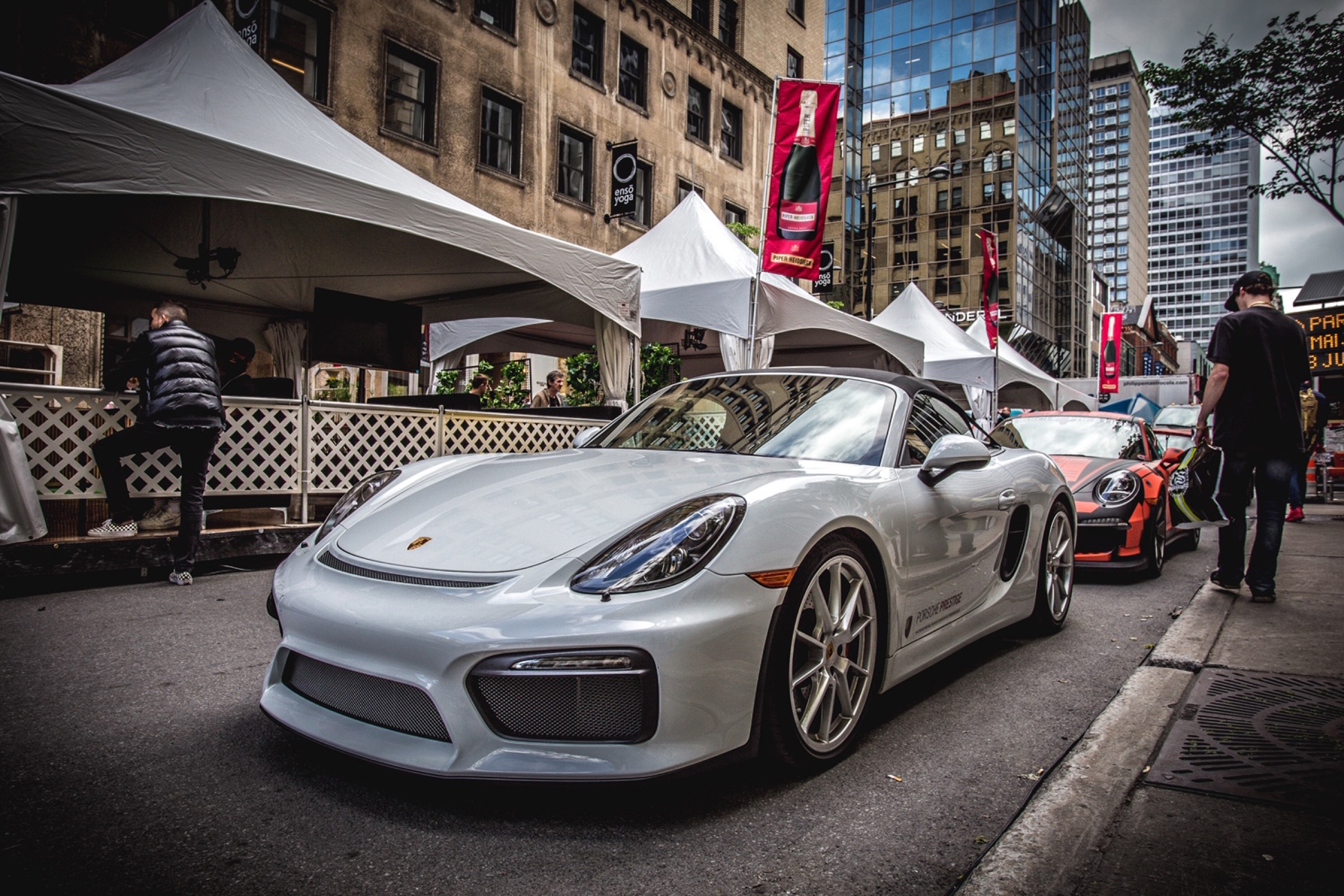 Silver Porsche on Boulevard de Maisonneuve / Peel during Festival Formule Peel — supercars on the Main, GP weekend