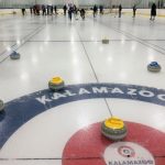 Group of People Playing Curling in Montreal for a Bachelor Party